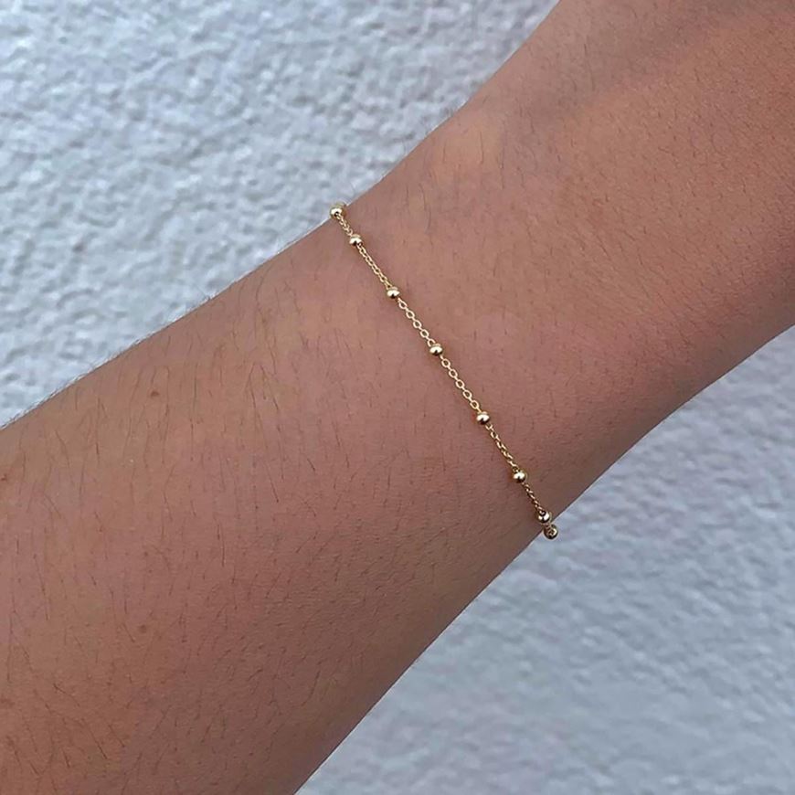 Foto de Pulsera plata baño oro bolitas