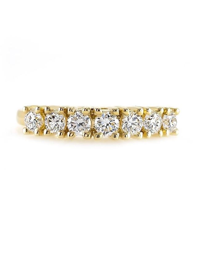 Foto de Sortija en oro amarillo 18kt y 7 circonitas blancas brillantes engastadas en garras