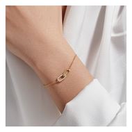 Foto de Pulsera de plata baño oro con eslabones entrelazados y circonitas blancas