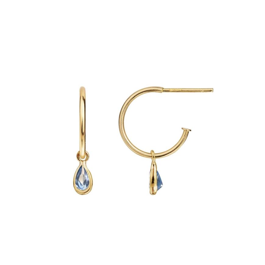 Foto de Pendientes de aro redondo con charm pera de circonitas azules oro amarillo 18kt