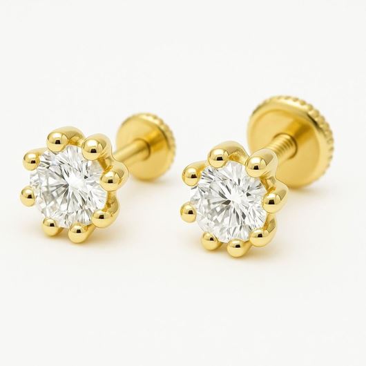 Foto de Pendientes de bebé Puntos de luz de 8 garras en oro amarillo 18kt y circonitas blancas