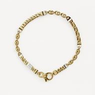 Foto de Pulsera en Oro Bicolor 18kt con Eslabones Planos Forzados y Calabrotes