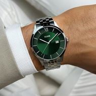 Foto de Reloj Cluse Aravis de 3 manecillas en acero, color verde y plateado.