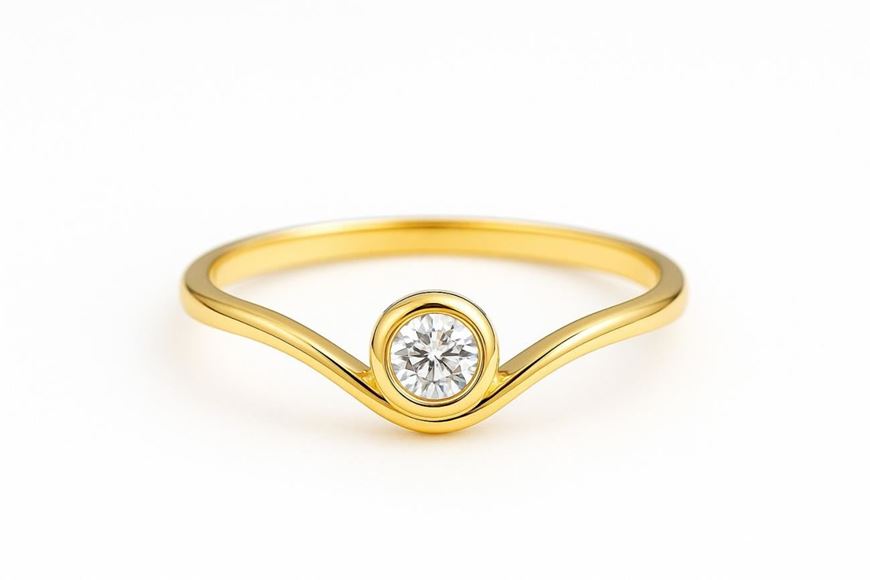 Foto de Anillo oro amarillo 18 kt en v con circonita