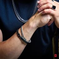 Foto de Pulsera cuero trenzado y placa de acero en negro 19cm