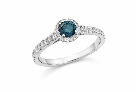 Foto de Sortija en oro blanco 18kt 1 brillante azul de 0,30ct y 39 brillantes de 0,26ct total