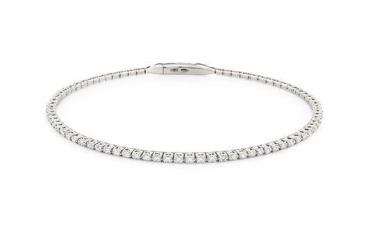 Foto de Pulsera caña flexible de oro blanco 18kt y 51 brillantes de 0,51ct total