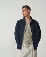 Foto de Cazadora con cremallera en tejido técnico elástico marino