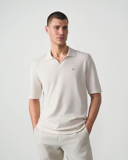 Foto de Polo de punto manga corta color marfil