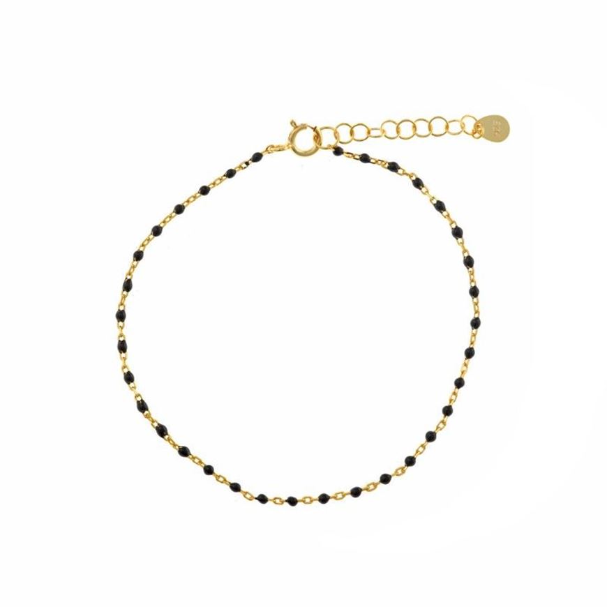 Foto de Pulsera plata baño oro con bolitas esmaltadas negro
