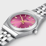 Foto de Mini reloj retro de los años 70, de acero, color fucsia y plateado