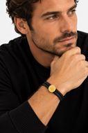 Foto de Pulsera de piel negra y acero baño oro 20cm